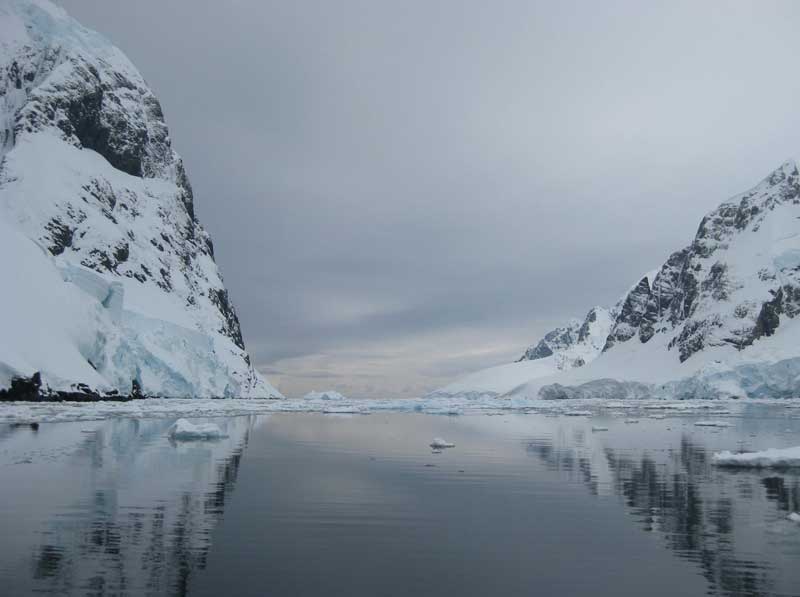 Reflections: ice and frozen rock in the Lemaire Channel, Antarctic Peninsula; looking south